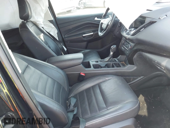 2018 Ford Escape Titanium with VIN 1FMCU9J95JUB30803, listed as a IAAI auction lot 42286536 with 63,309 mi miles and . Bid and sale history available at DreamBid. Image 5.