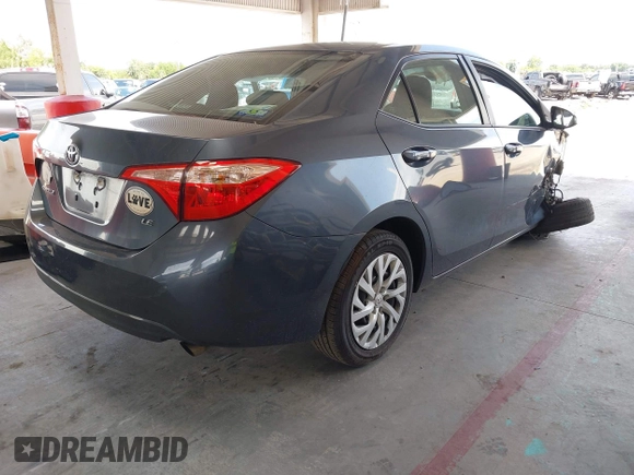 2018 Toyota Corolla L z VIN 5YFBURHE0JP802699, wystawiony jako IAAI lot #42486454 z przebiegiem 134 040 mil mil oraz . Historia ofert i sprzedaży dostępna na DreamBid. Obrazek 4.