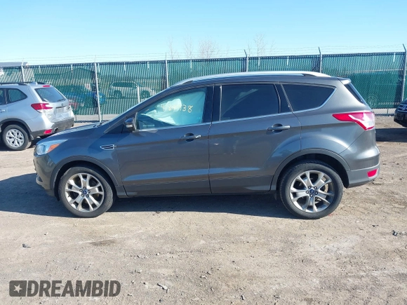 2015 Ford Escape Titanium with VIN 1FMCU9J9XFUB46843, listed as a IAAI auction lot 41800938 with 91,034 mi miles. Bid and sale history available at carsss.com. Image 14.