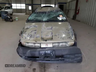 1997 Saturn SL with VIN 1G8ZH5288VZ126846, listed as a Copart auction lot 47024465 with 152,336 mi miles and Salvage Title. Bid and sale history available at carsss.com. Image 5.