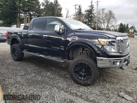 2016 Nissan Titan XD Platinum Reserve with VIN 1N6BA1F49GN500481, listed as a Copart auction lot 88679525 with 42,820 mi miles and Salvage Title. Bid and sale history available at carsss.com. Image 4.
