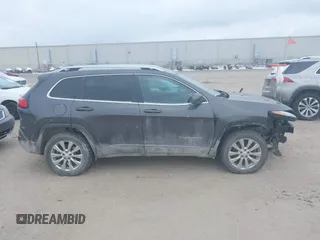 2018 Jeep Cherokee Overland with VIN 1C4PJMJX5JD594240, listed as a IAAI auction lot 41285832 with 130,334 mi miles. Bid and sale history available at carsss.com. Image 13.