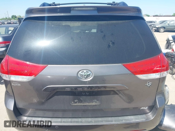 2014 Toyota Sienna XLE with VIN 5TDYK3DC4ES419928, listed as a IAAI auction lot 41976538 with 144,405 mi miles. Bid and sale history available at carsss.com. Image 16.