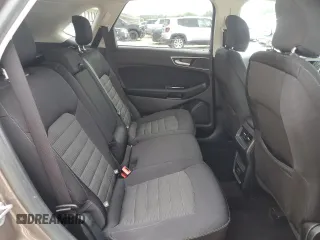 2019 Ford Edge SEL с VIN 2FMPK3J99KBC40023, выставлен на аукционе Copart как лот 61362885 с пробегом 120 508 миль миль и Чистый • Clean title. История ставок и продаж доступна на DreamBid. Изображение 11.