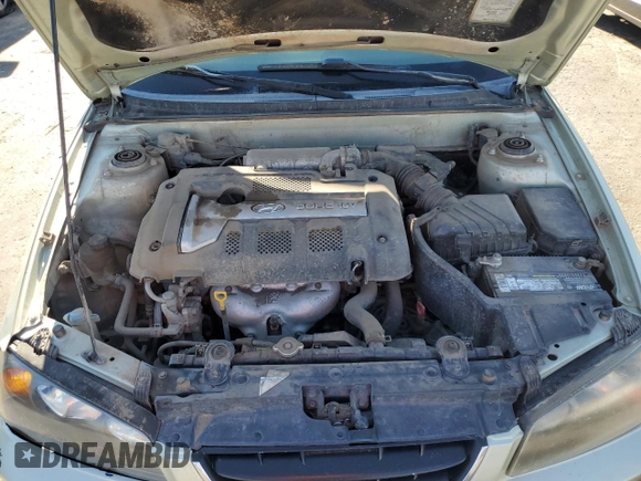 2004 Hyundai Elantra GLS z VIN KMHDN46D64U919337, wystawiony jako Copart lot #54627945 z przebiegiem 184 087 mil mil oraz Szkoda całkowita • Salvage title. Historia ofert i sprzedaży dostępna na DreamBid. Obrazek 11.