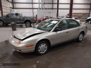 2001 Saturn SL with VIN 1G8ZH52851Z215574, listed as a IAAI auction lot 41538803 with 130,771 mi miles. Bid and sale history available at carsss.com. Image 17.