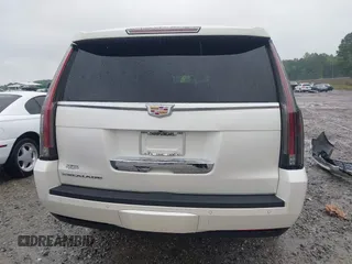 2015 Cadillac Escalade ESV Premium z VIN 1GYS4TKJ6FR708255, wystawiony jako IAAI lot #42244621 z przebiegiem 31 407 mil mil oraz . Historia ofert i sprzedaży dostępna na DreamBid. Obrazek 17.