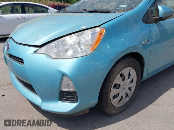 2014 Toyota Prius One with VIN JTDKDTB30E1077183, listed as a IAAI auction lot 42183675 with 92,560 mi miles and . Bid and sale history available at DreamBid. Image 6.