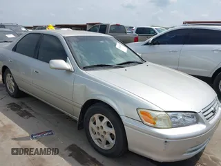 2001 Toyota Camry CE z VIN JT2BG22K910547065, wystawiony jako IAAI lot #42433457 z przebiegiem 262 593 mil mil oraz . Historia ofert i sprzedaży dostępna na DreamBid. Obrazek 1.
