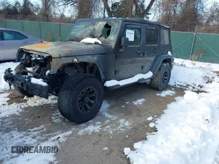 2017 Jeep Wrangler Unlimited Sport with VIN 1C4BJWDG7HL645433, listed as a IAAI auction lot 41240538 with 132,100 mi miles. Bid and sale history available at carsss.com. Image 2.