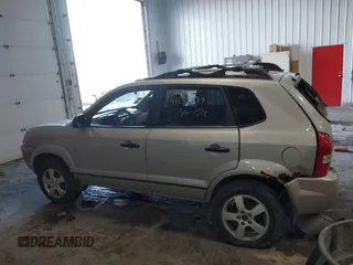 2005 Hyundai Tucson GL with VIN KM8JM12B25U171048, listed as a IAAI auction lot 41634099 with 188,086 mi miles. Bid and sale history available at carsss.com. Image 13.