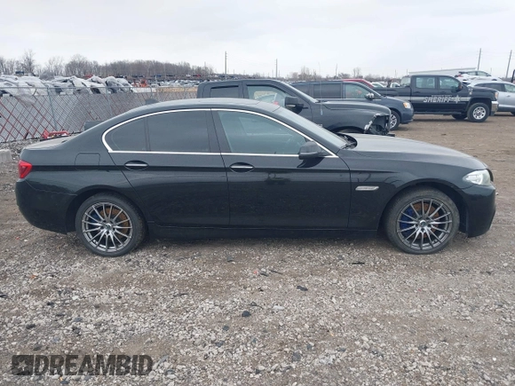 2014 BMW 5 Series 535d with VIN WBAXA5C51ED691018, listed as a IAAI auction lot 41887112 with 174,684 mi miles and . Bid and sale history available at carsss.com. Image 13.