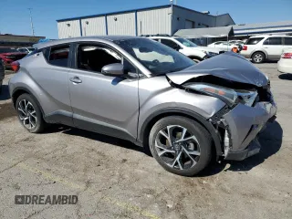 2018 Toyota C-HR XLE z VIN NMTKHMBX5JR014024, wystawiony jako Copart lot #56367465 z przebiegiem 79 882 mil mil oraz Szkoda całkowita • Salvage title. Historia ofert i sprzedaży dostępna na DreamBid. Obrazek 4.