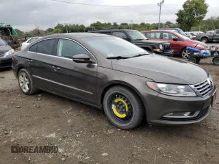 2014 Volkswagen CC R-Line with VIN WVWBP7AN0EE528915, listed as a Copart auction lot 72925784 with 127,339 mi miles and Salvage Title. Bid and sale history available at carsss.com. Image 4.