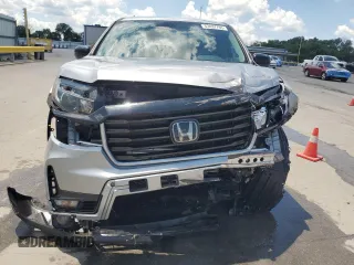 2021 Honda Ridgeline Sport with VIN 5FPYK3F18MB014841, listed as a Copart auction lot 63437765 with 52,293 mi miles and Salvage title. Bid and sale history available at DreamBid. Image 5.