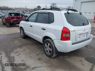 2006 Hyundai Tucson GL with VIN KM8JM12BX6U467288, listed as a IAAI auction lot 41679827 with 146,973 mi miles. Bid and sale history available at carsss.com. Image 3.