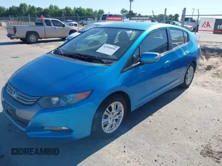2010 Honda Insight EX with VIN JHMZE2H74AS013148, listed as a IAAI auction lot 42194894 with 114,885 mi miles and . Bid and sale history available at DreamBid. Image 2.