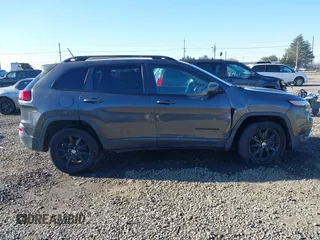 2014 Jeep Cherokee Latitude with VIN 1C4PJMCB5EW294631, listed as a IAAI auction lot 41453628 with 127,847 mi miles and . Bid and sale history available at DreamBid. Image 14.