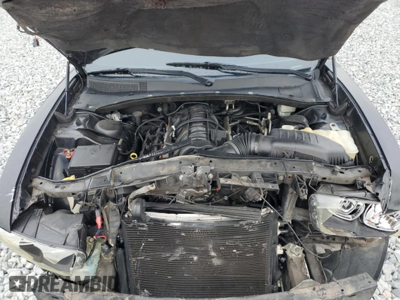 2012 Dodge Charger Police with VIN 2C3CDXATXCH230930, listed as a Copart auction lot 51456915 with 101,325 mi miles and Salvage Title. Bid and sale history available at carsss.com. Image 12.