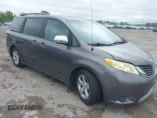 2014 Toyota Sienna LE AAS with VIN 5TDKK3DC9ES448461, listed as a IAAI auction lot 41986724 with 102,930 mi miles and . Bid and sale history available at carsss.com. Image 1.