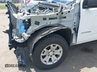2018 Chevrolet Colorado 2WD Work Truck z VIN 1GCHSBEN4J1155188, wystawiony jako IAAI lot #42340002 z przebiegiem 83 422 mil mil oraz . Historia ofert i sprzedaży dostępna na DreamBid. Obrazek 6.