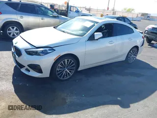 2023 BMW 2 Series 228i with VIN WBA53AK00P7M12823, listed as a IAAI auction lot 42093921 with 24,577 mi miles. Bid and sale history available at carsss.com. Image 2.