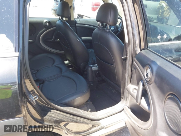 2012 MINI Countryman with VIN WMWZB3C51CWM05034, listed as a IAAI auction lot 42235437 with 131,280 mi miles and . Bid and sale history available at DreamBid. Image 8.