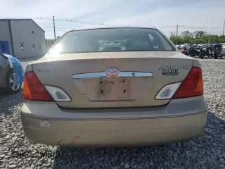 2001 Toyota Avalon XL z VIN 4T1BF28B01U175170, wystawiony jako Copart lot #58497125 z przebiegiem 99 699 mil mil oraz Tytuł czysty. Historia ofert i sprzedaży dostępna na DreamBid. Obrazek 6.