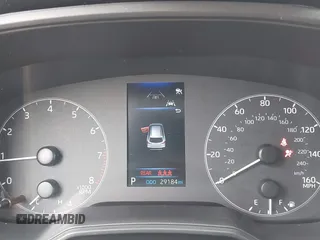 2023 Toyota Corolla Cross L with VIN 7MUAAAAG9PV047205, listed as a IAAI auction lot 41898077 with 29,184 mi miles and . Bid and sale history available at DreamBid. Image 7.
