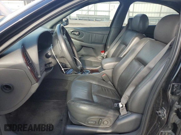 2001 Oldsmobile Aurora with VIN 1G3GR62H714104411, listed as a Copart auction lot 82601984 with 135,486 mi miles and Salvage Title. Bid and sale history available at DreamBid. Image 7.