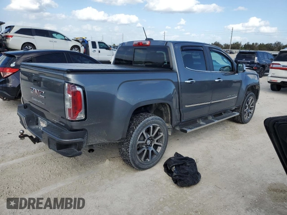 2021 GMC Canyon 4WD Denali with VIN 1GTG6EEN7M1281163, listed as a Copart auction lot 78996944 with 49,299 mi miles and Non Repairable. Bid and sale history available at carsss.com. Image 3.