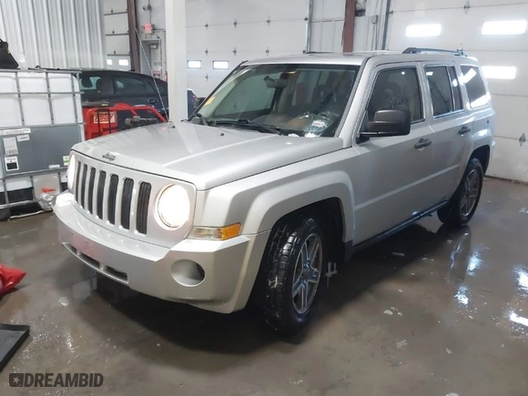 2009 Jeep Patriot Sport with VIN 1J4FT28BX9D160194, listed as a IAAI auction lot 41253940 with 104,339 mi miles. Bid and sale history available at carsss.com. Image 2.