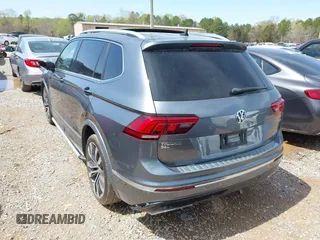 2018 Volkswagen Tiguan SEL Premium with VIN 3VV5B7AX4JM201579, listed as a IAAI auction lot 41932201 with 118,728 mi miles and . Bid and sale history available at DreamBid. Image 3.
