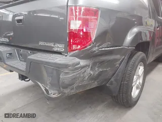 2011 Honda Ridgeline RTL with VIN 5FPYK1F57BB004189, listed as a IAAI auction lot 41871741 with 193,913 mi miles. Bid and sale history available at carsss.com. Image 6.