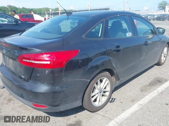 2015 Ford Focus SE with VIN 1FADP3F23FL258730, listed as a IAAI auction lot 42608180 with 212,647 mi miles and . Bid and sale history available at DreamBid. Image 4.
