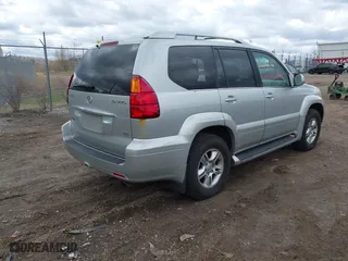 2004 Lexus GX 470 with VIN JTJBT20X140038154, listed as a IAAI auction lot 42034484 with 176,440 mi miles. Bid and sale history available at carsss.com. Image 4.