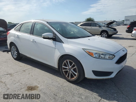 2015 Ford Focus SE with VIN 1FADP3F2XFL220072, listed as a Copart auction lot 58058255 with 128,871 mi miles and Clean title. Bid and sale history available at DreamBid. Image 4.
