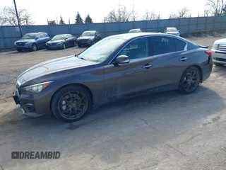 2014 Infiniti Q50 Hybrid Sport with VIN JN1AV7AR7EM703030, listed as a IAAI auction lot 41661844 with 128,202 mi miles. Bid and sale history available at carsss.com. Image 2.