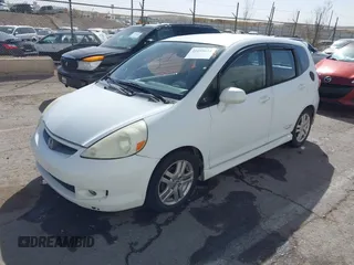 2007 Honda Fit Sport z VIN JHMGD38657S030086, wystawiony jako IAAI lot #41699824 z przebiegiem 224 648 mil mil oraz . Historia ofert i sprzedaży dostępna na DreamBid. Obrazek 17.