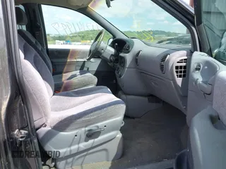 1999 Dodge Grand Caravan with VIN 1B4GP54GXXB897614, listed as a IAAI auction lot 42141997 with 157,698 mi miles and . Bid and sale history available at DreamBid. Image 5.