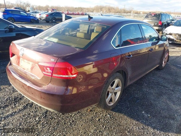 2013 Volkswagen Passat SE w/Sunroof with VIN 1VWBP7A31DC126908, listed as a IAAI auction lot 41216276 with 145,699 mi miles. Bid and sale history available at carsss.com. Image 4.