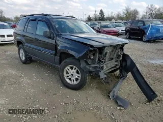 2004 Jeep Grand Cherokee Laredo with VIN 1J4GW48S84C184757, listed as a Copart auction lot 52895745 with 242,307 mi miles and Salvage Title. Bid and sale history available at carsss.com. Image 11.