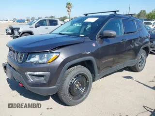 2019 Jeep Compass Trailhawk with VIN 3C4NJDDB3KT759849, listed as a IAAI auction lot 42141467 with 100,915 mi miles and . Bid and sale history available at DreamBid. Image 17.