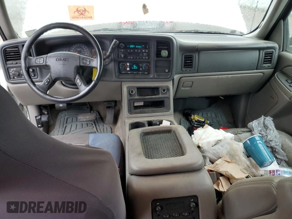 2005 GMC Yukon XL SLE z VIN 1GKEC16Z25J175610, wystawiony jako Copart lot #51051785 z przebiegiem 271 619 mil mil oraz Szkoda całkowita • Salvage title. Historia ofert i sprzedaży dostępna na DreamBid. Obrazek 8.