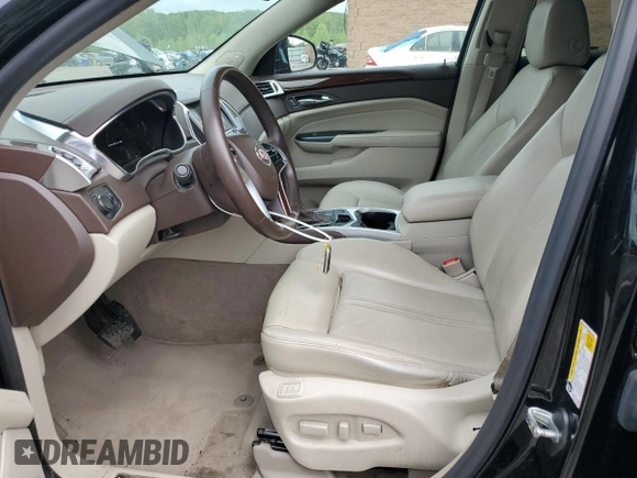 2015 Cadillac SRX Luxury Collection z VIN 3GYFNEE33FS574163, wystawiony jako Copart lot #56667985 z przebiegiem 103 697 mil mil oraz Szkody całkowita. Historia ofert i sprzedaży dostępna na DreamBid. Obrazek 7.