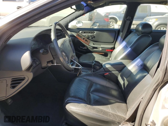 1999 Oldsmobile Aurora with VIN 1G3GR62C7X4109461, listed as a Copart auction lot 75916764 with 107,690 mi miles and Salvage Title. Bid and sale history available at DreamBid. Image 7.