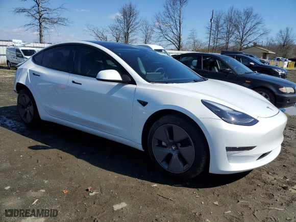 2023 Tesla Model 3 with VIN 5YJ3E1EA3PF610069, listed as a Copart auction lot 50327635 with 19,495 mi miles and Salvage Title. Bid and sale history available at carsss.com. Image 4.