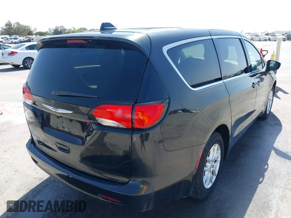 2017 Chrysler Pacifica Touring with VIN 2C4RC1DG6HR501164, listed as a IAAI auction lot 41863304 with 87,705 mi miles and . Bid and sale history available at DreamBid. Image 4.