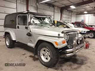 2005 Jeep Wrangler Unlimited with VIN 1J4FA44S05P359173, listed as a IAAI auction lot 41275179 with 75,035 mi miles. Bid and sale history available at carsss.com. Image 1.