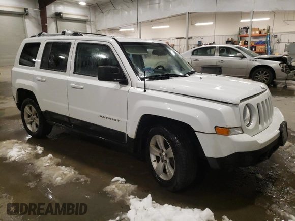 2011 Jeep Patriot Latitude X with VIN 1J4NF4GB2BD263910, listed as a Copart auction lot 84872014 with 162,067 mi miles and Salvage Title. Bid and sale history available at DreamBid. Image 4.